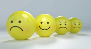 Yellow balls with Facial expressions ranging from happy to sad