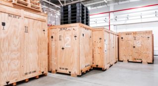 Custom machinery crating crates in a warehouse